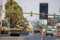 Heat waves rise as construction crews pave S. Las Vegas Boulevard near the Peppermill Las Vegas ...