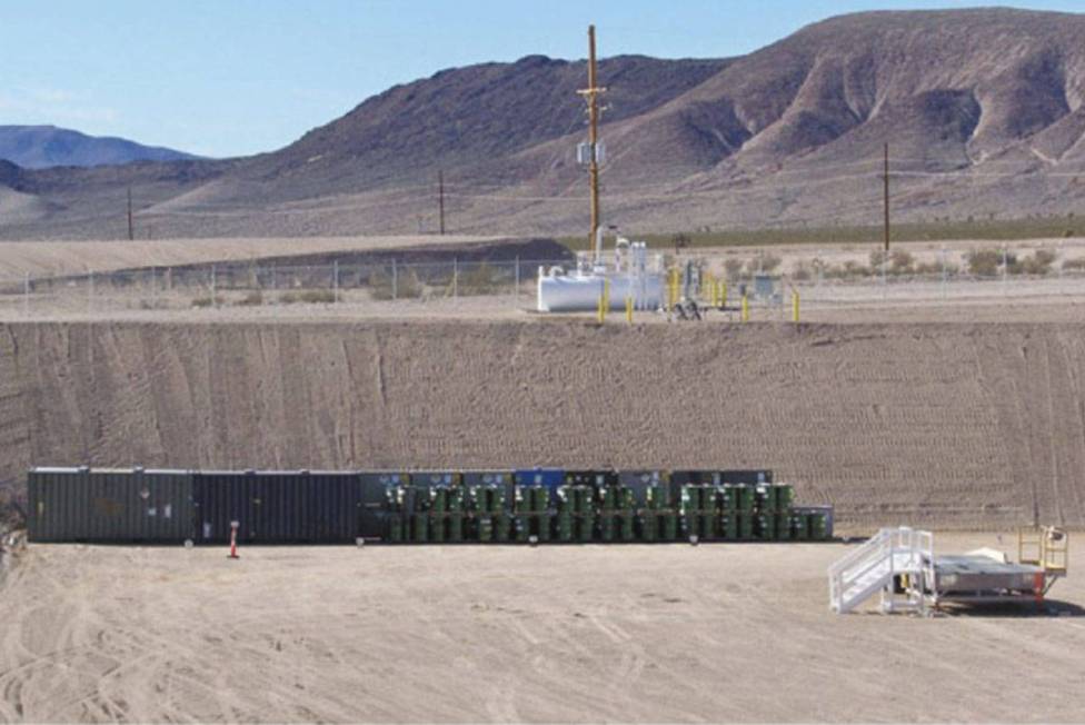 Waste packages are shown at the end of landfill cell in Area 5 at the Nevada National Security ...