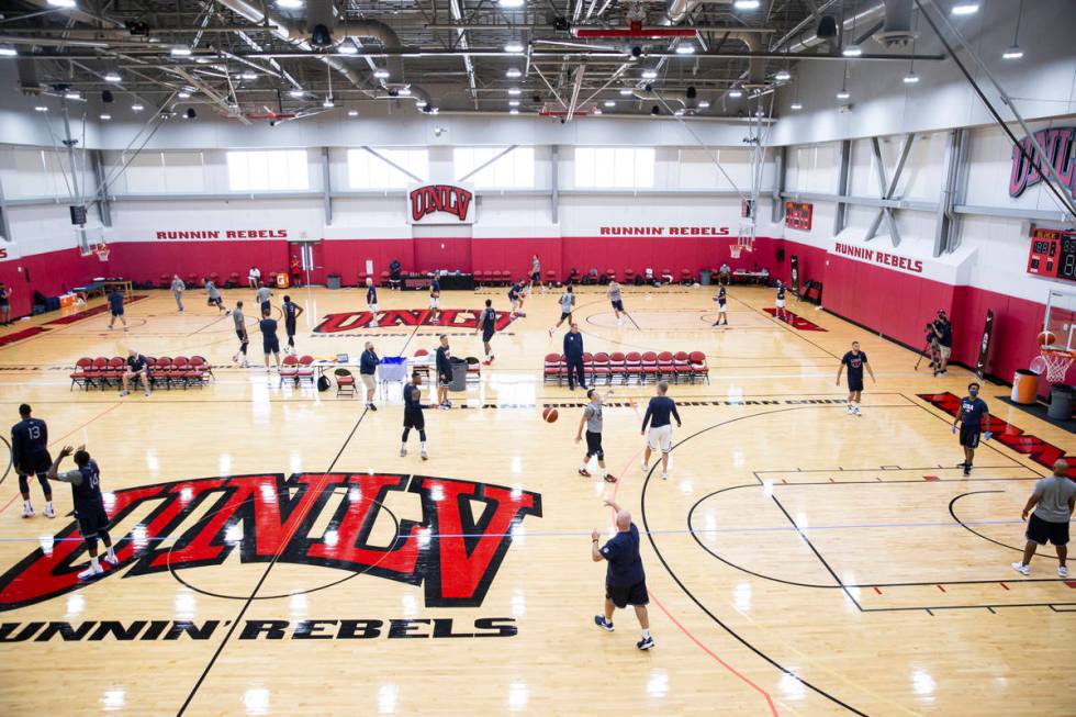 Players train during the first day of USA Basketball practice, ahead of the Olympics, at Menden ...