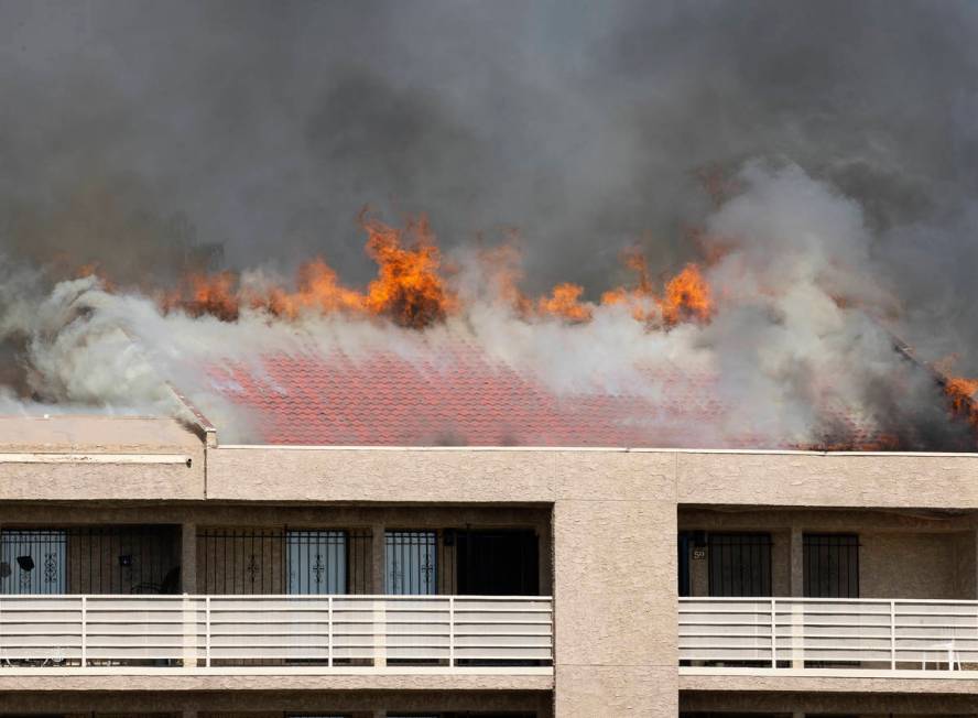 Flames reached up to the roof of Bonanza Park Studios as Las Vegas firefighters battle a fire o ...