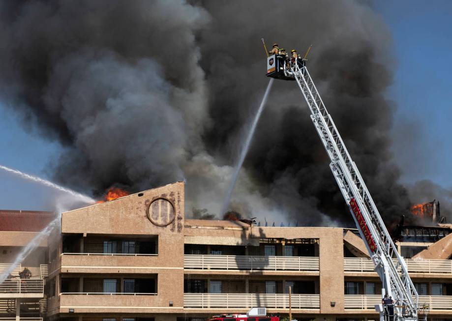 Las Vegas firefighters battle a fire at Bonanza Park Studios on 2221 Bonanza Road, on Friday, J ...