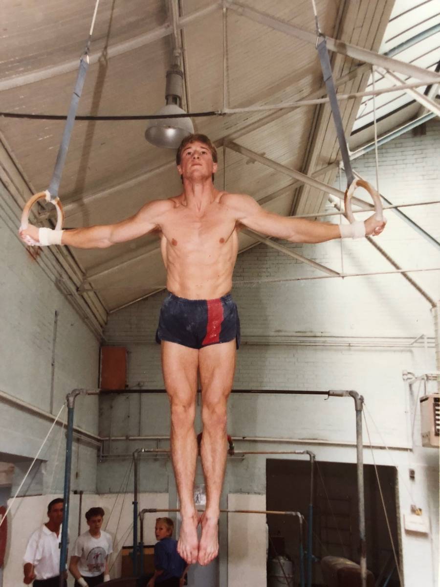 Paul Bowler, then about 20, practices rings at Gorton Gymnastic Centre in Manchester, England. ...