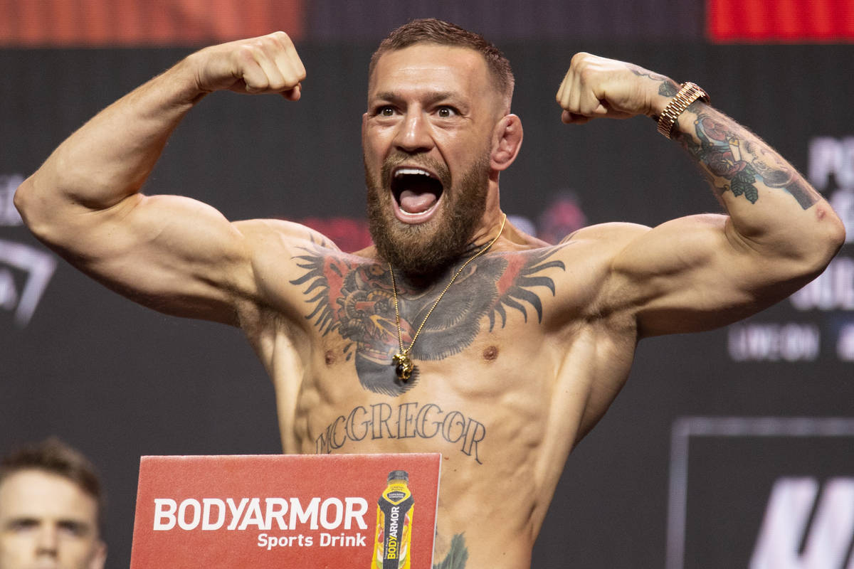 Conor McGregor poses during the UFC 264 weigh-in event at T-Mobile Arena in Las Vegas, Friday, ...