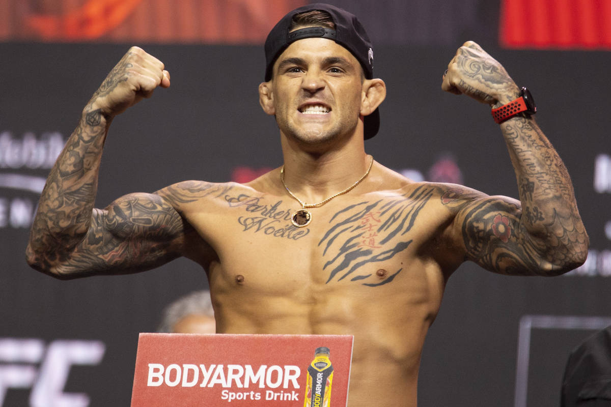 Dustin Poirier poses during the UFC 264 weigh-in event at T-Mobile Arena in Las Vegas, Friday, ...