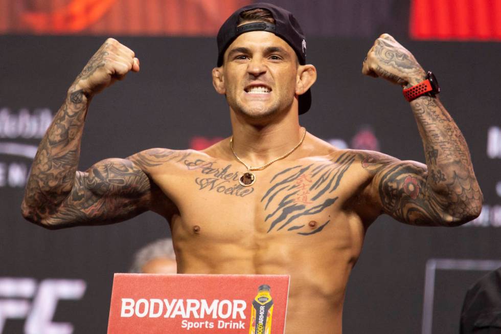 Dustin Poirier poses during the UFC 264 weigh-in event at T-Mobile Arena in Las Vegas, Friday, ...