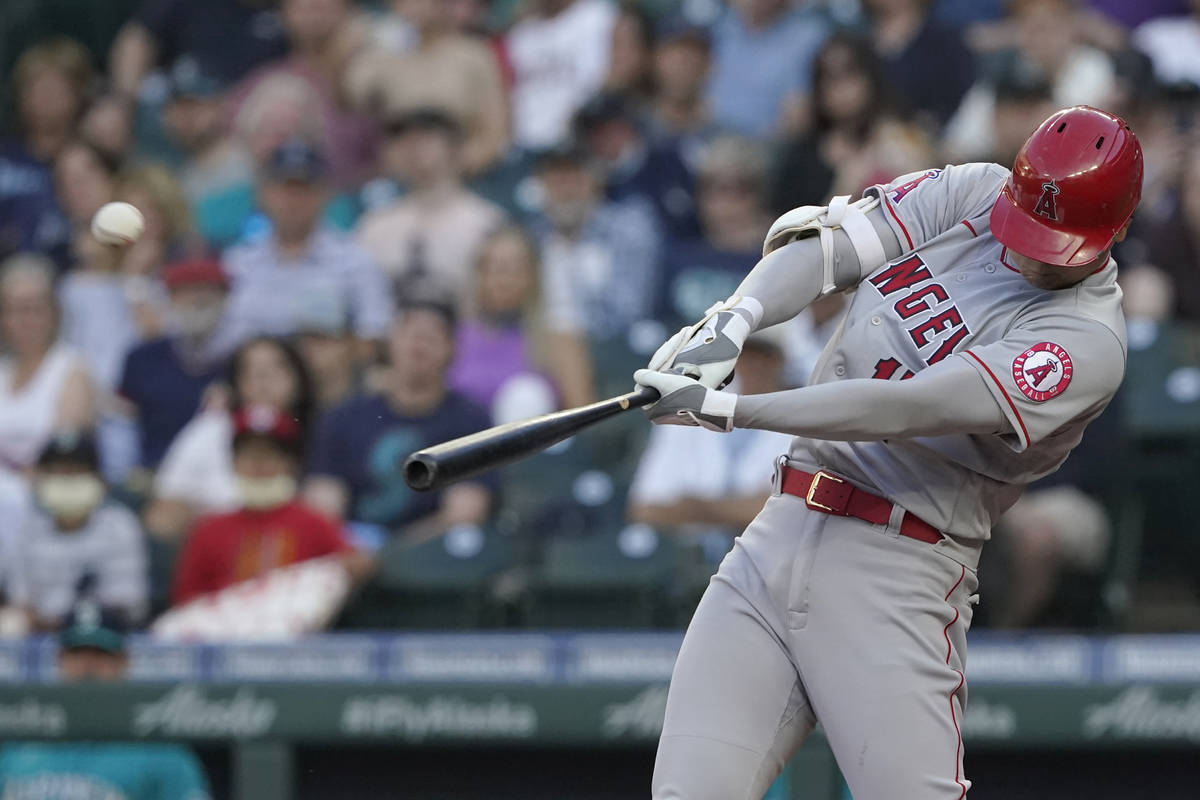 Los Angeles Angels' Shohei Ohtani hits a solo home run during the third inning of a baseball ga ...