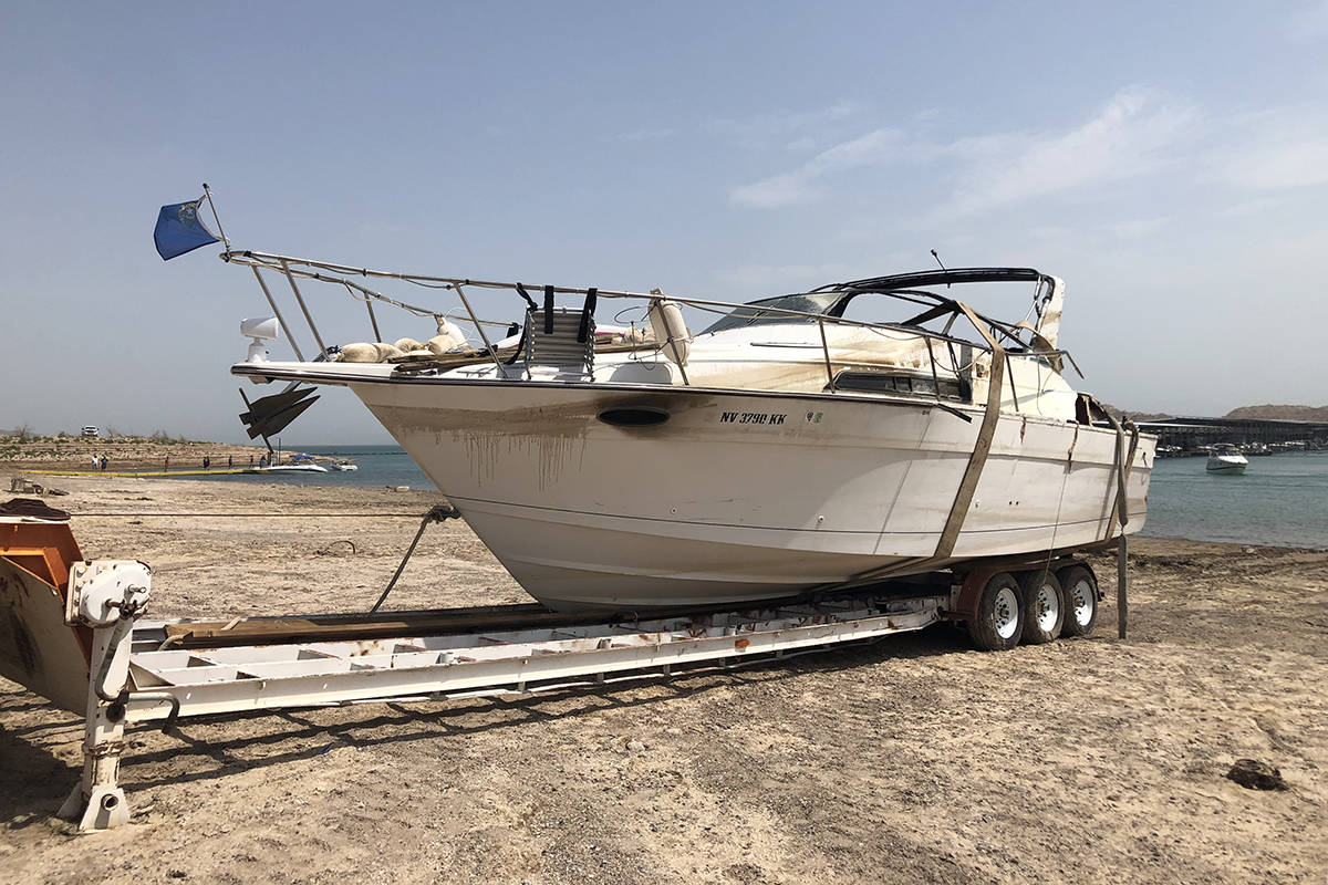 A damaged vessel is seen Sunday, July 11, 2021, outside Las Vegas Boat Harbor at Lake Mead afte ...