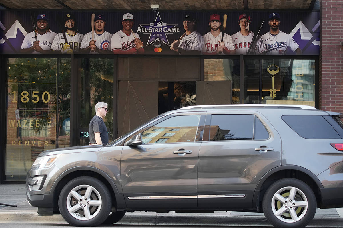 A vehicle stands in the loading zone outside the Maven Hotel Sunday, July 11, 2021, in lower do ...