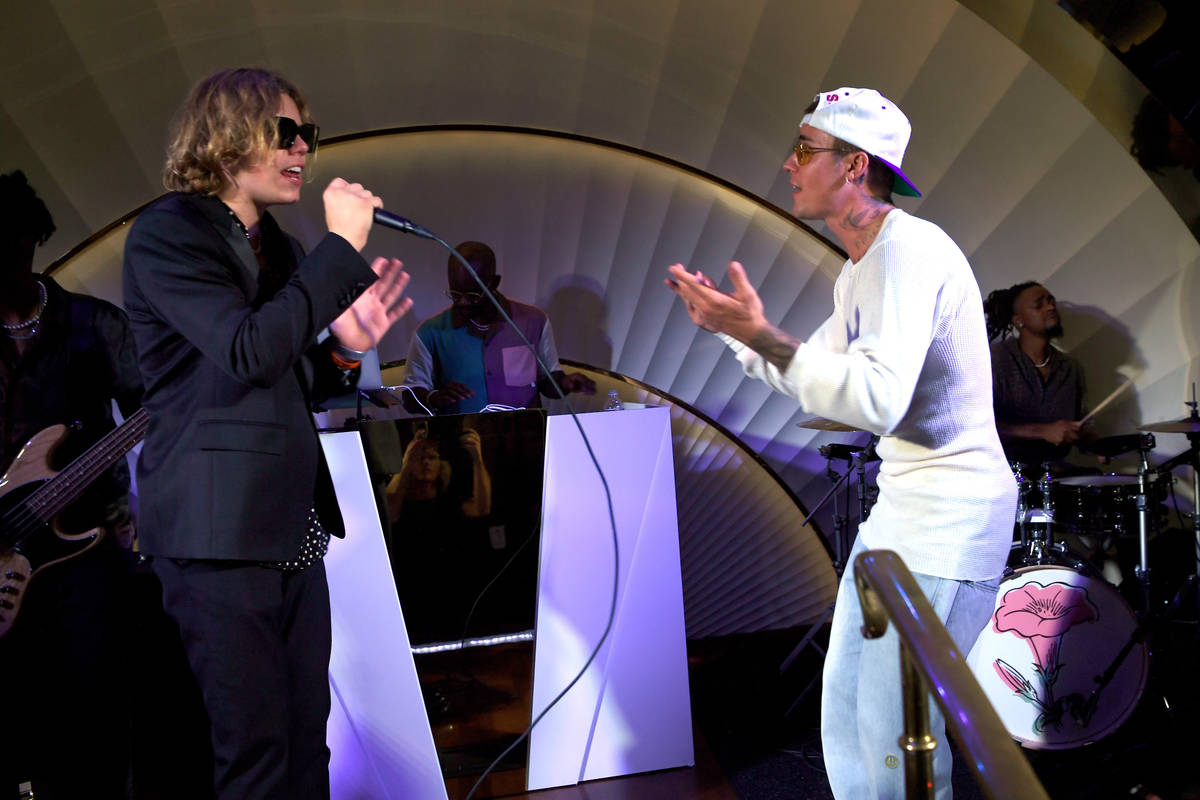 Justin Bieber performs with Kid Laroi at h.wood Group's grand opening of Delilah at Wynn Las V ...