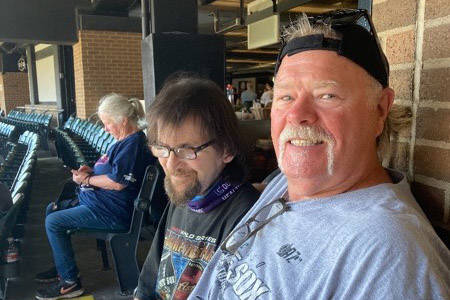 Las Vegan Mike Wurst, foreground, and his longtime friend and fellow Chicago White Sox fan Larr ...