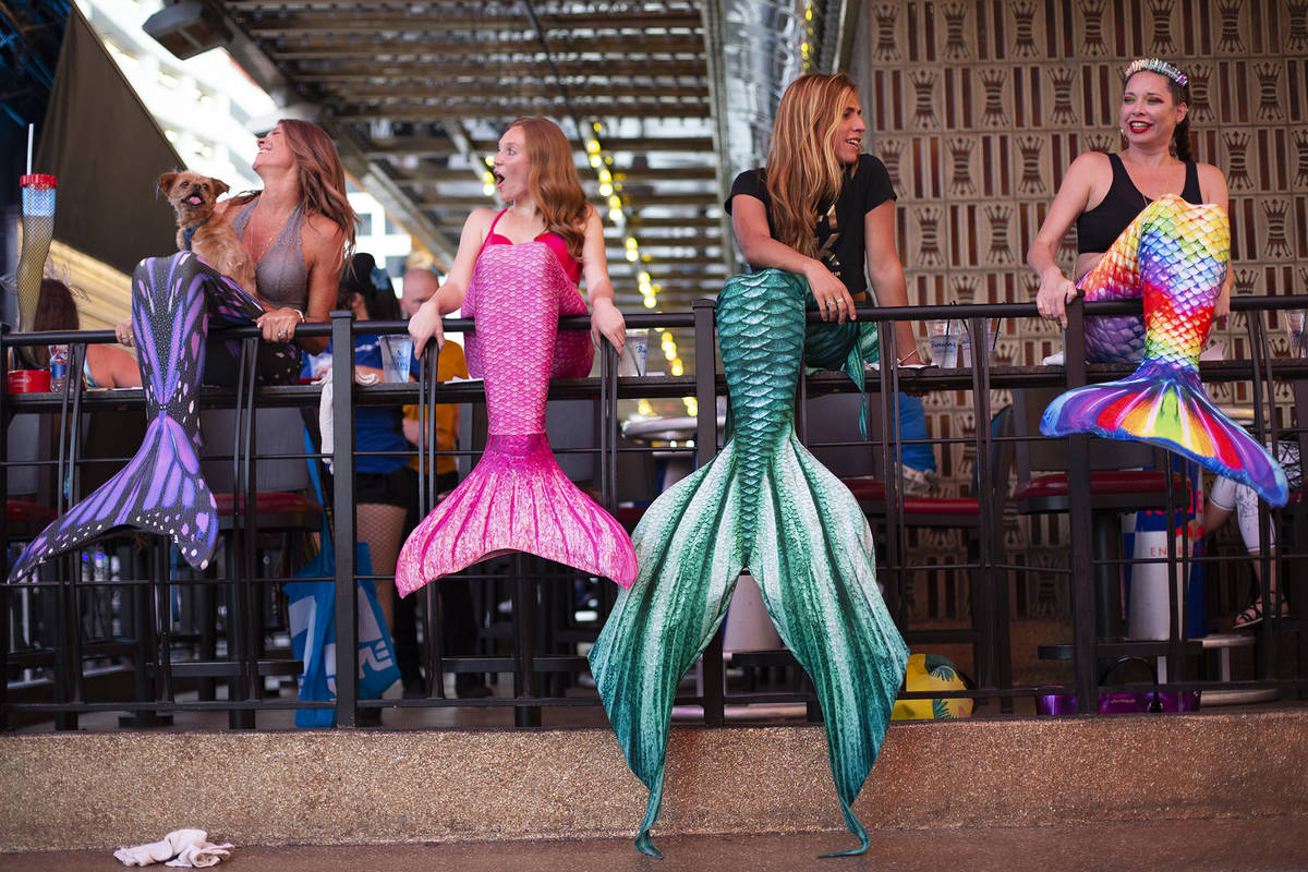 From left, mermaids Veronika Valentine, Miranda Huizing, The Traveling Merman and JJ Sin City p ...