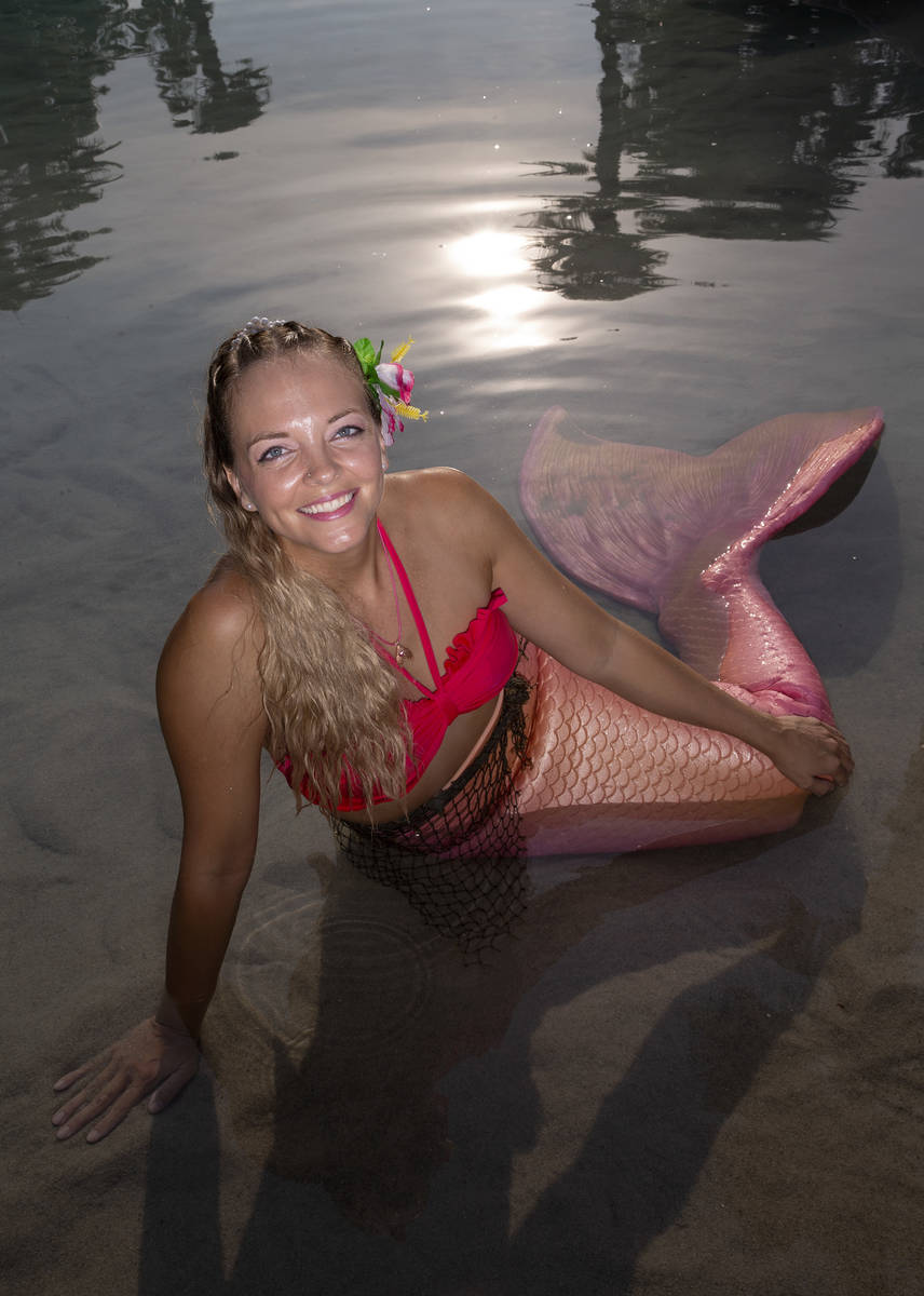 Mermaid CaySea, whose real name is Casey McConachie, in the pool at Tahiti Village Resort on Fr ...