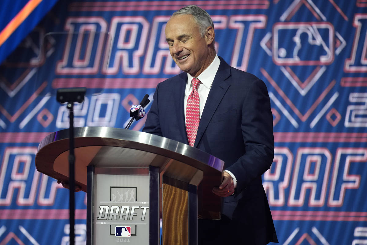 MLB Commissioner Rob Manfred reacts as he is booed by fans during the first round of the 2021 M ...