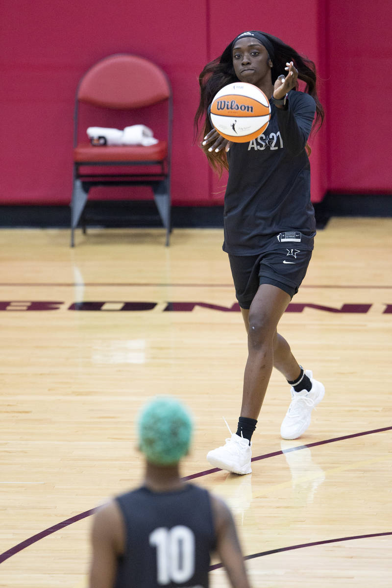 Kahleah Copper passes to Courtney Williams during a 2021 Team WNBA practice in Mendenhall Cente ...