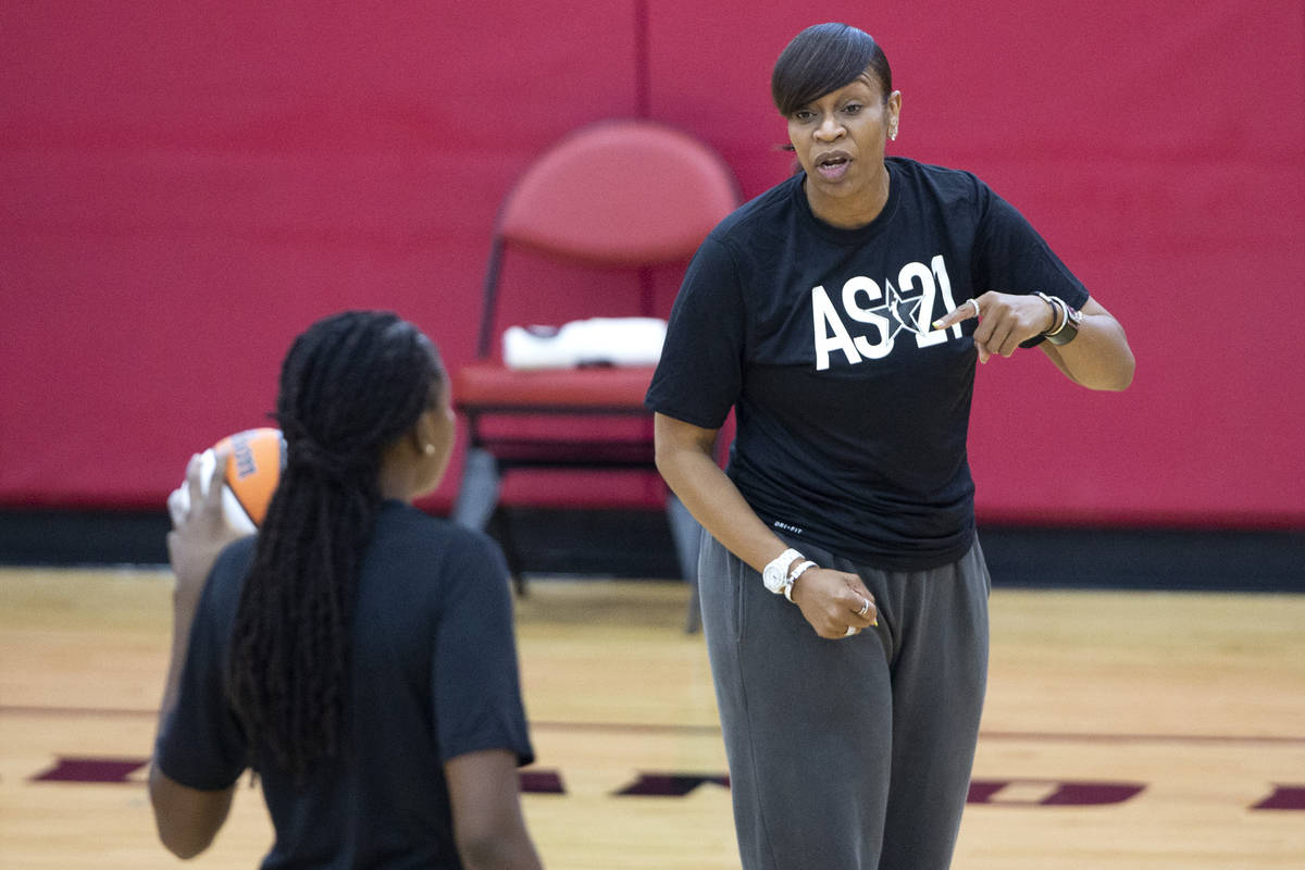 Co-head coach Tina Thompson communicates with Jonquel Jones during a 2021 Team WNBA practice in ...