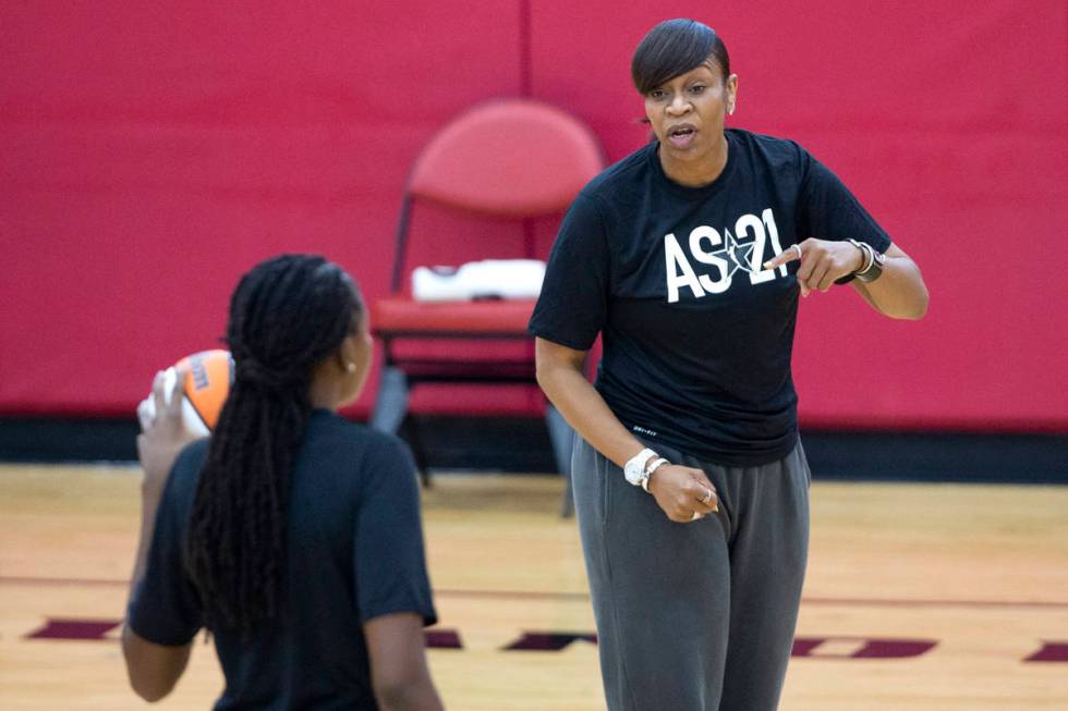 Co-head coach Tina Thompson communicates with Jonquel Jones during a 2021 Team WNBA practice in ...