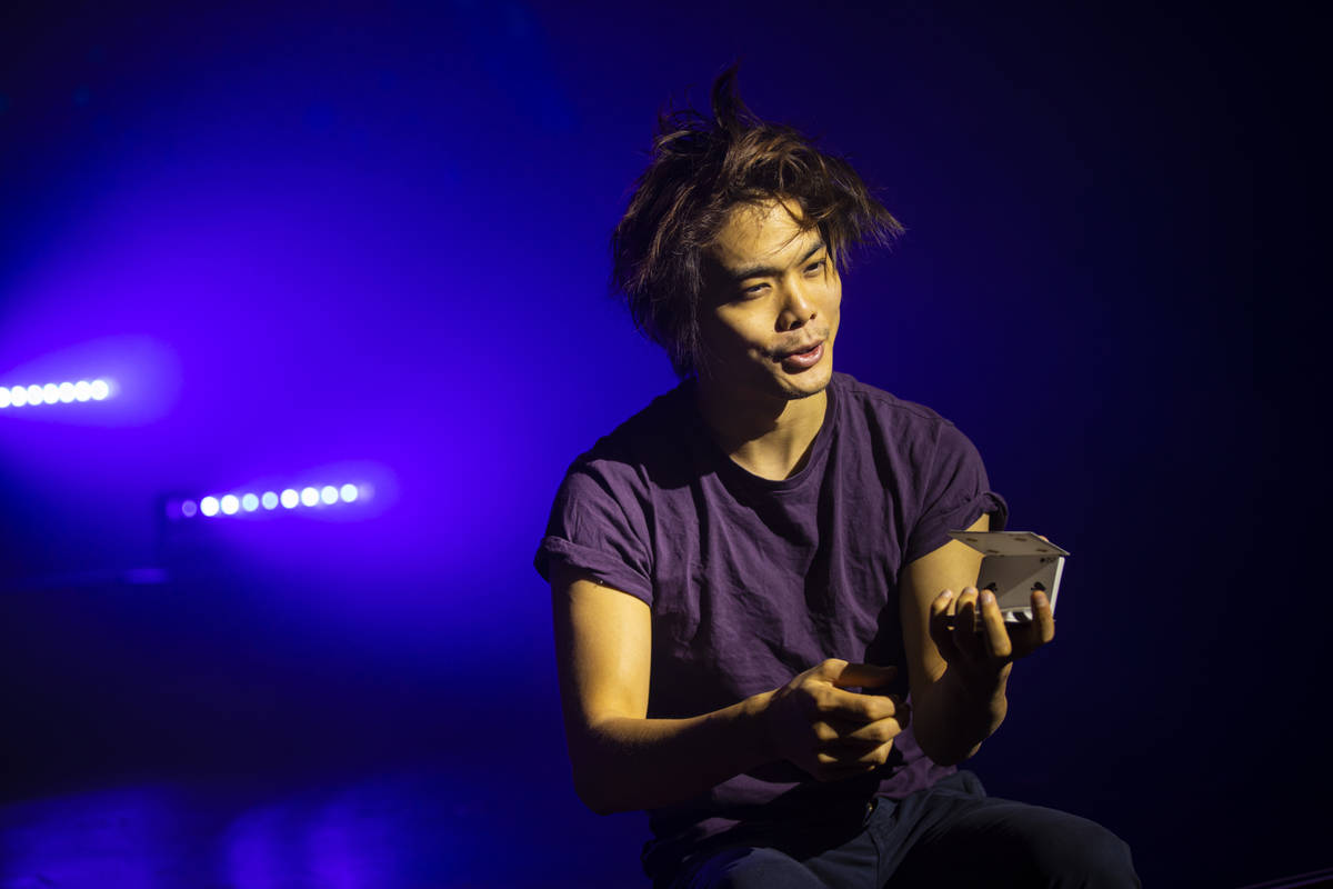 Illusionist Shin Lim performs tricks onstage ahead of the reopening of his show, “Limitl ...
