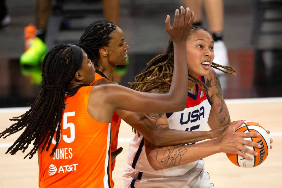 Team WNBA's Jonquel Jones (35) and DeWanna Bonner, center, guard U.S. Women's National Team's B ...