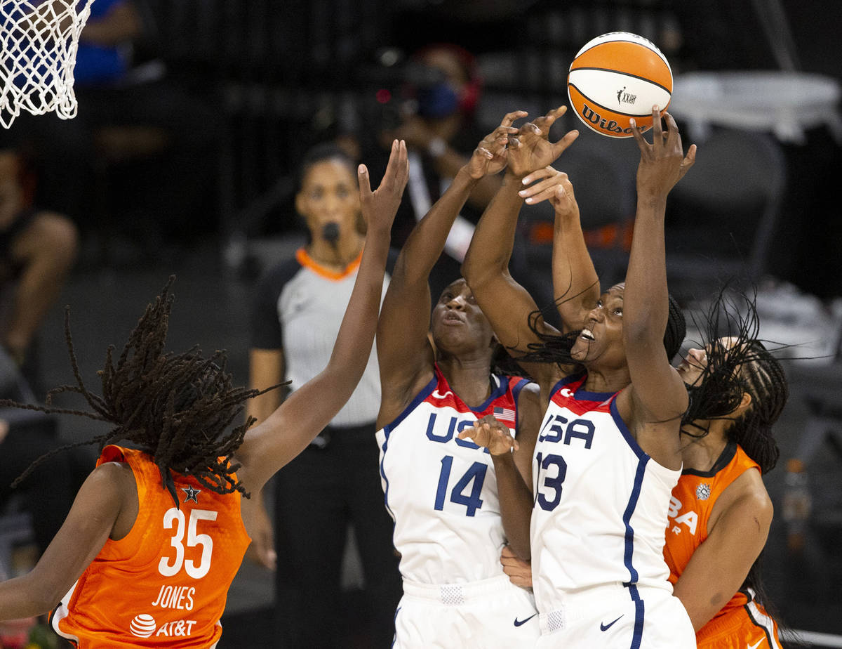 Team WNBA's Jonquel Jones (35) and Brionna Jones, right, guard as U.S. Women's National Team's ...