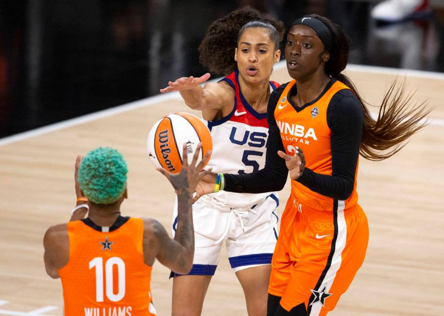 Team WNBA's Kahleah Copper (2) passes to her teammate Courtney Williams (10) while U.S. Women's ...