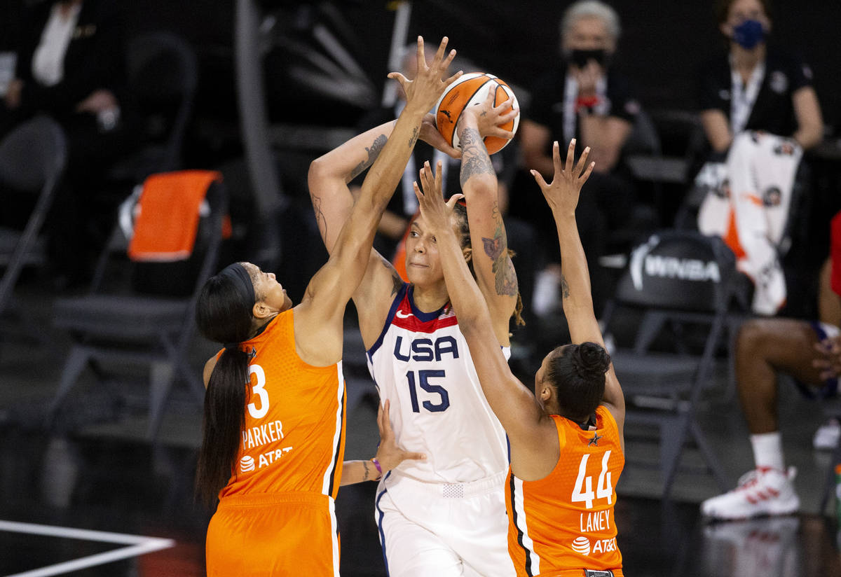 Team WNBA's Candace Parker (3) and Betnijah Laney (44) guard U.S. Women's National Team's Britt ...