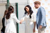 Britain's Prince Harry and Meghan, Duchess of Sussex visit a Youth Employment Services Hub in M ...