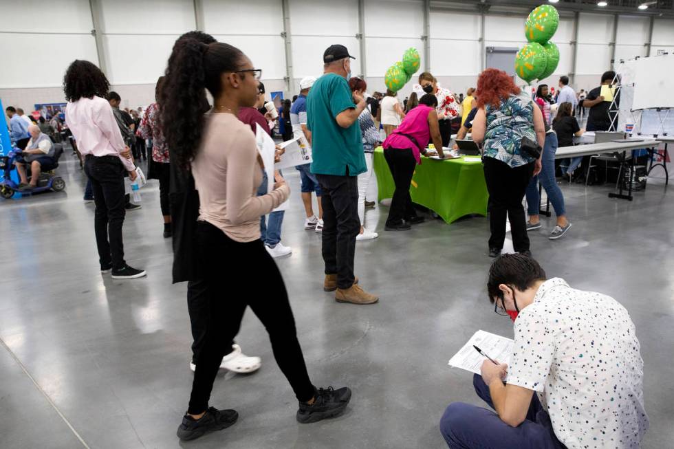 People seeking employment attend a summer job fair hosted by Clark County at Las Vegas Conventi ...