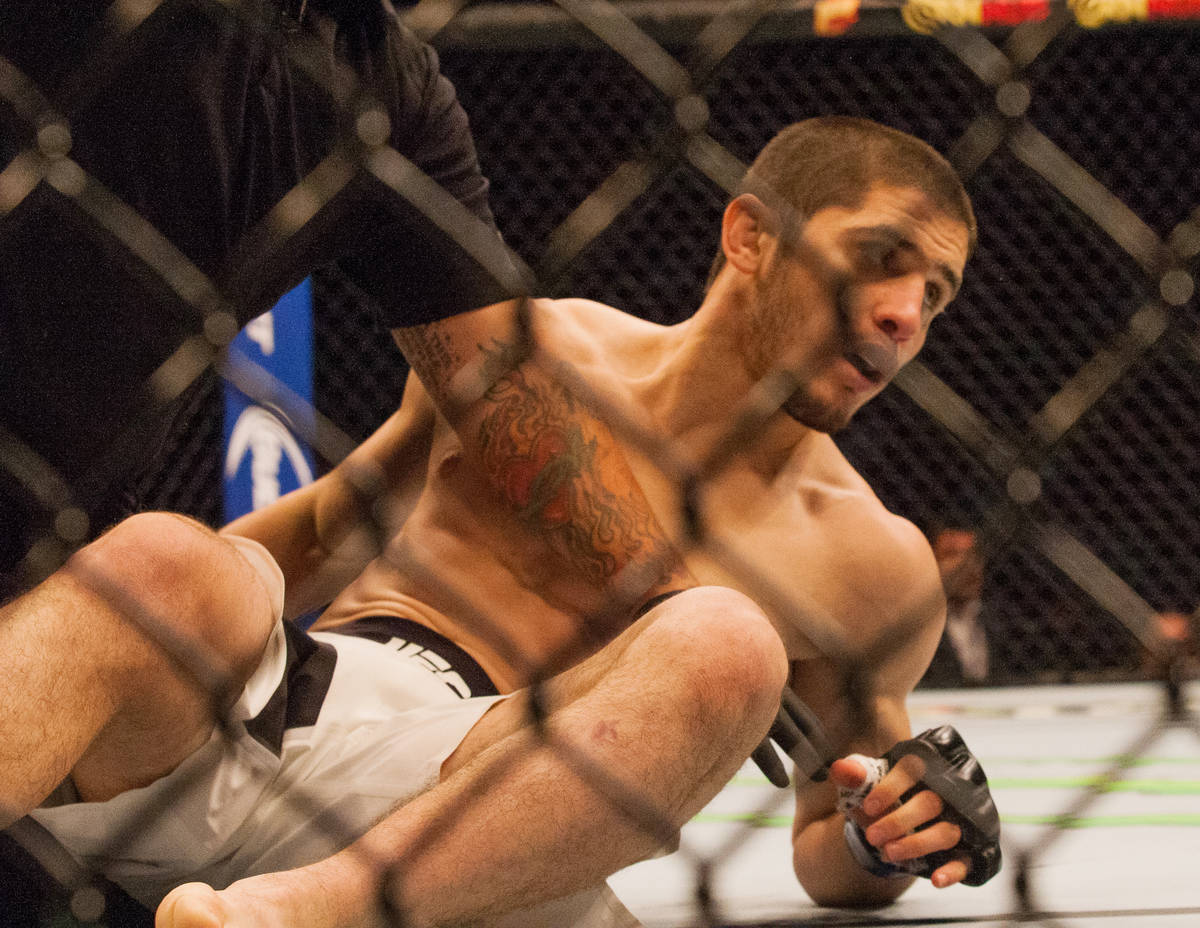 UFC fighter Islam Makhachev, is being help by the UFC medical staff in round-1 during the UFC 1 ...