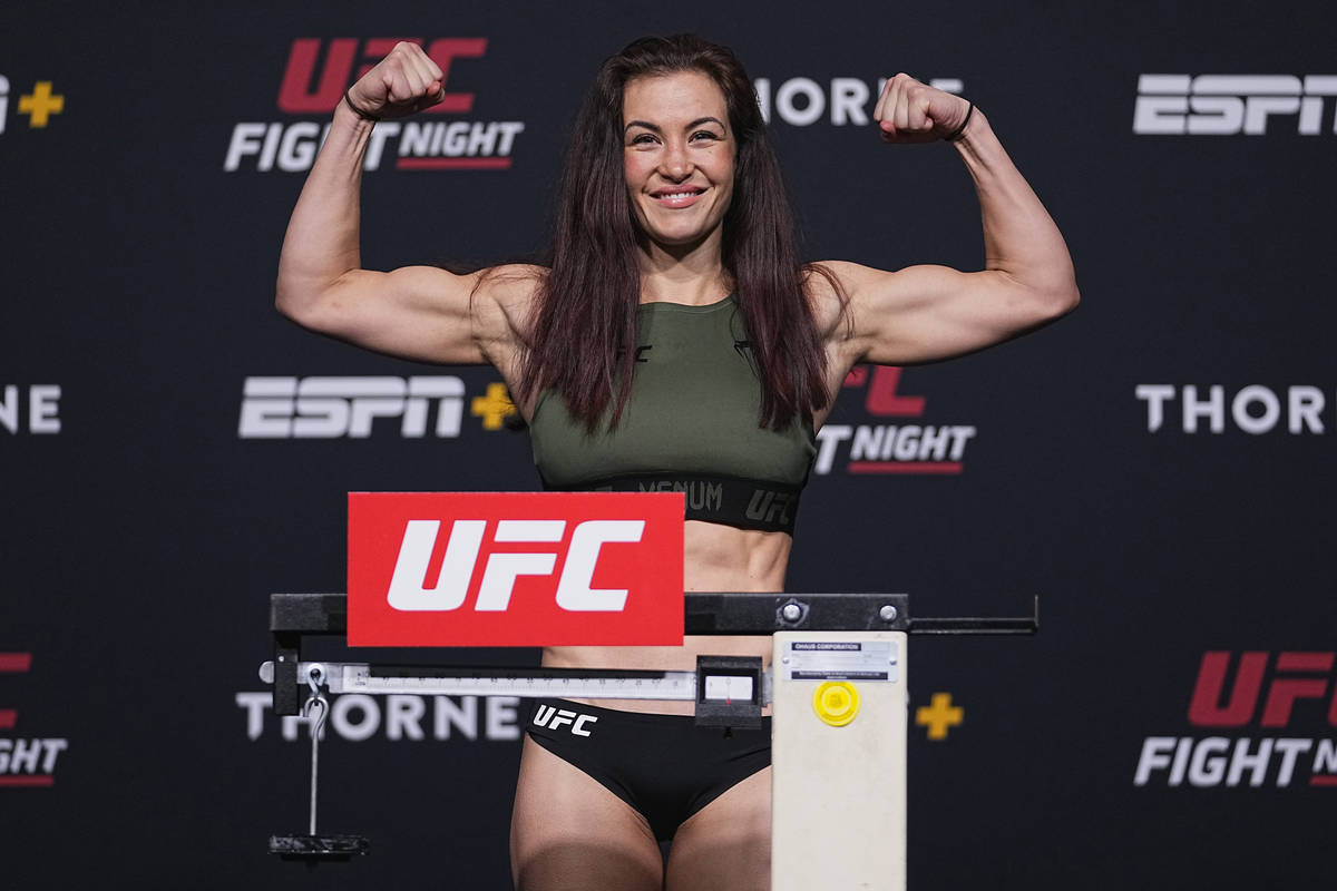 Miesha Tate poses on the scale during the UFC Fight Night weigh-in at UFC APEX on June 25, 2021 ...