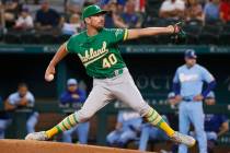 Oakland Athletics starting pitcher Chris Bassitt throws against the Texas Rangers during the fi ...