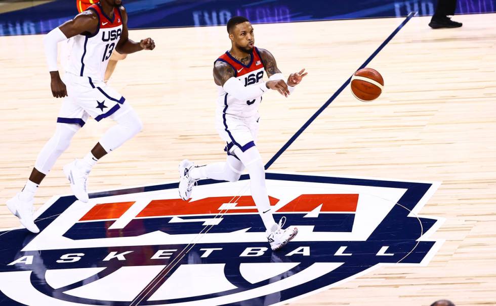United States guard Damian Lillard (6) passes the ball during the second half of an exhibition ...