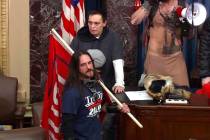In this file image from U.S. Capitol Police video, Paul Allard Hodgkins, 38, of Tampa, Fla., fr ...