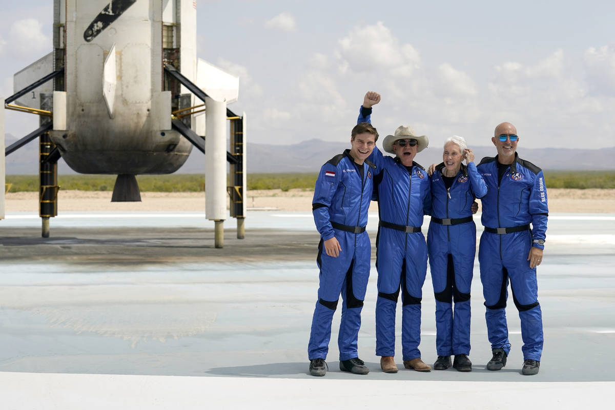 Oliver Daemen, from left, Jeff Bezos, founder of Amazon and space tourism company Blue Origin, ...
