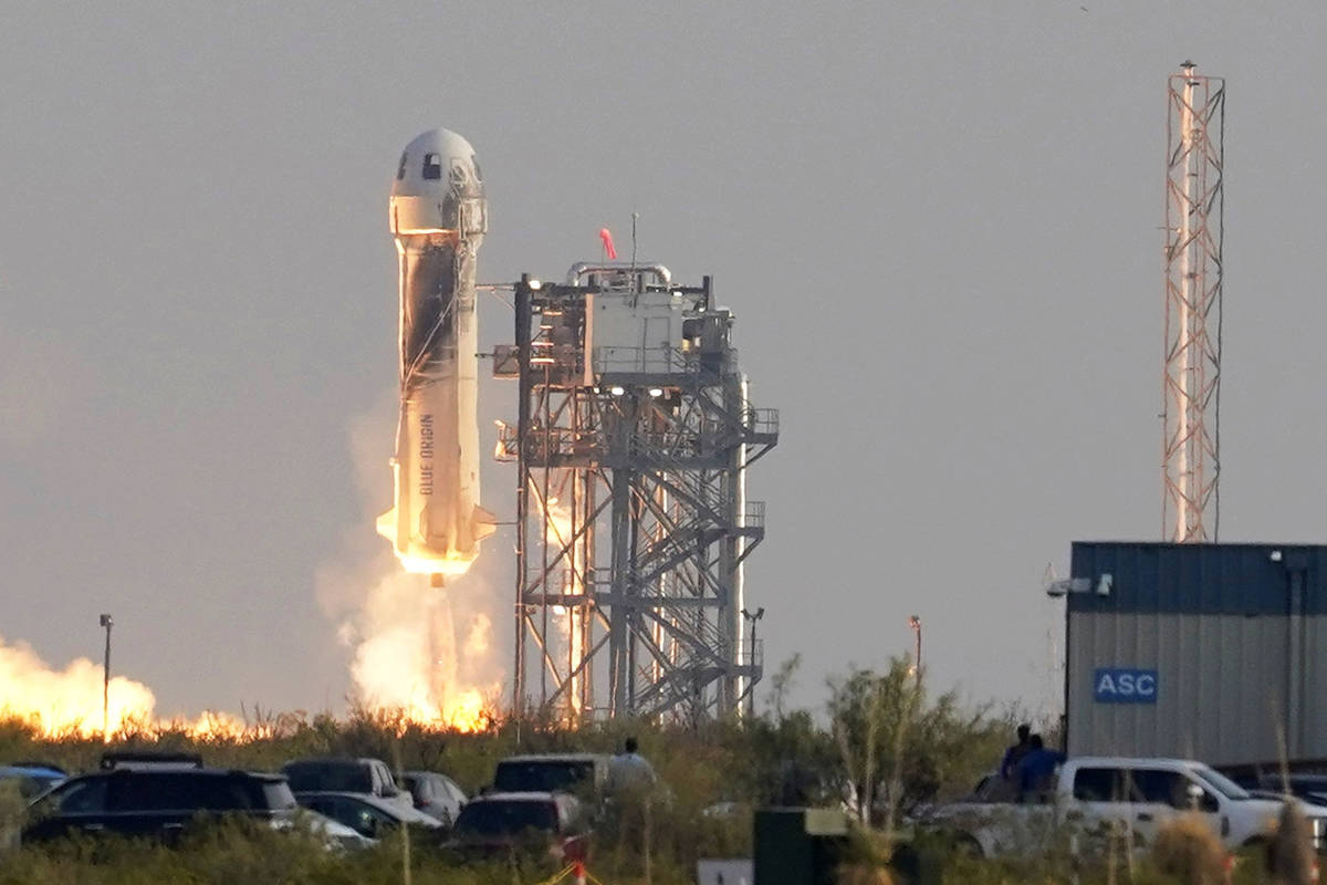Blue Origin's New Shepard rocket launches carrying passengers Jeff Bezos, founder of Amazon and ...