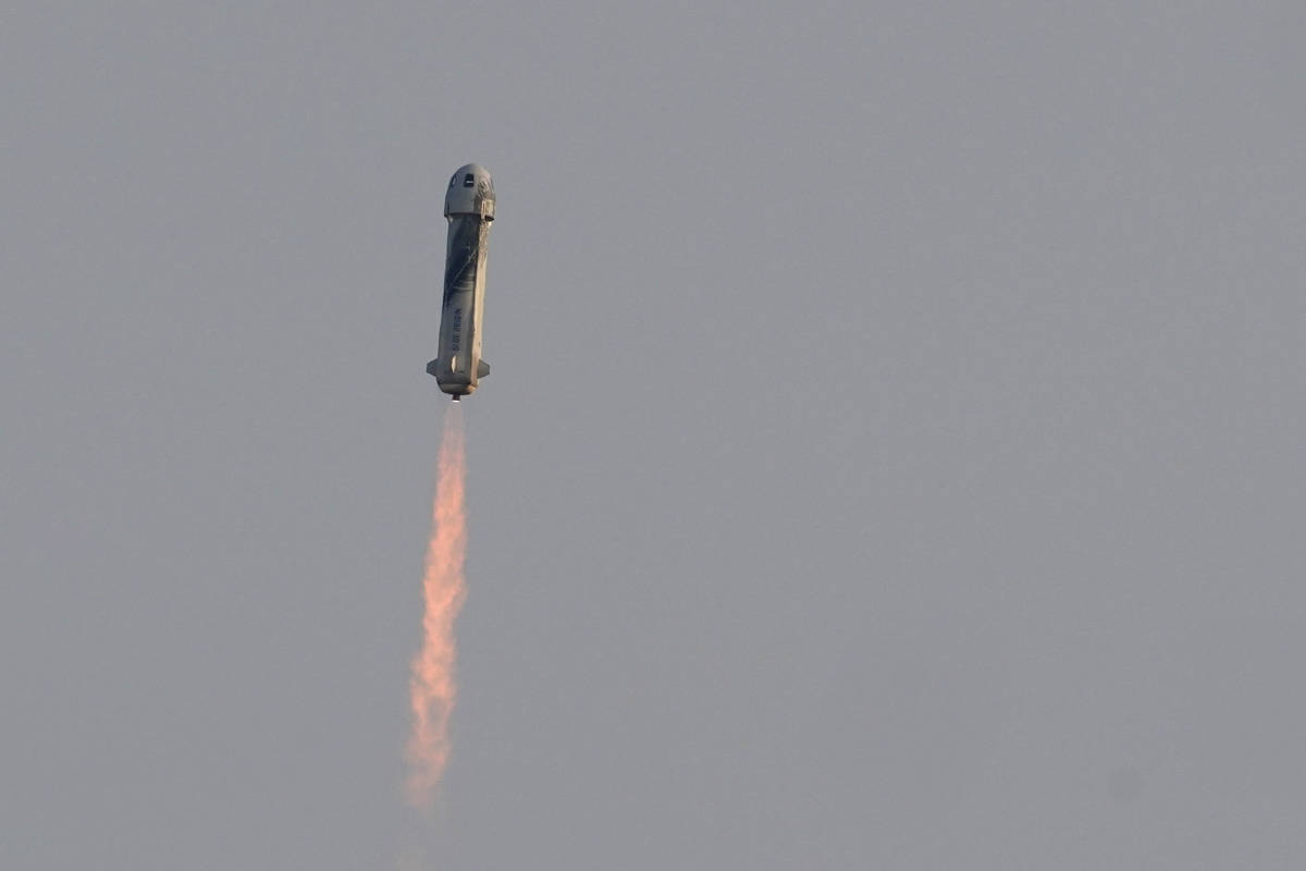 Blue Origin's New Shepard rocket launches carrying passengers Jeff Bezos, founder of Amazon and ...