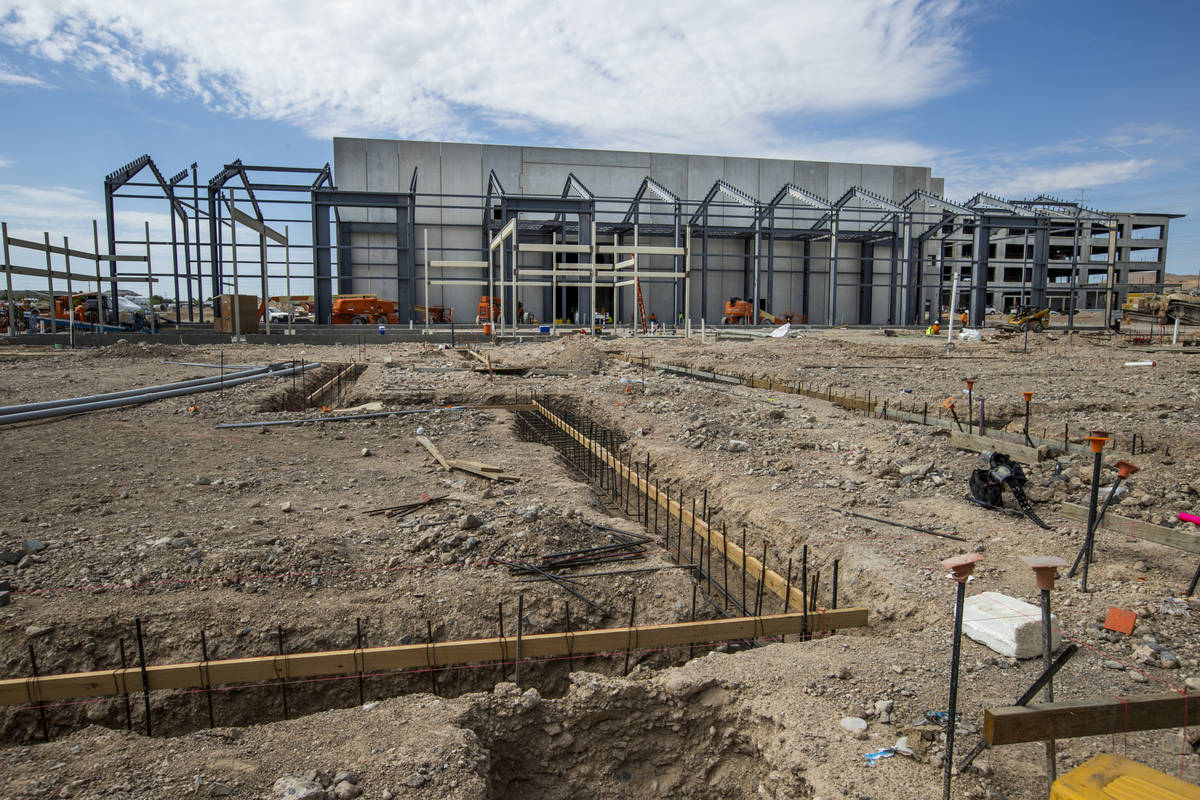 The Market Hall and other building foundations take shape at UnCommons, a mixed-use complex bei ...