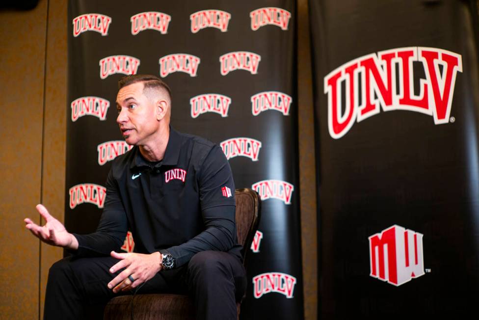 UNLV football coach Marcus Arroyo responds to questions during Mountain West Conference media d ...