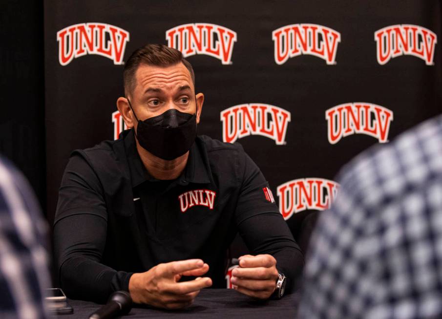 UNLV football coach Marcus Arroyo responds to questions during Mountain West Conference media d ...