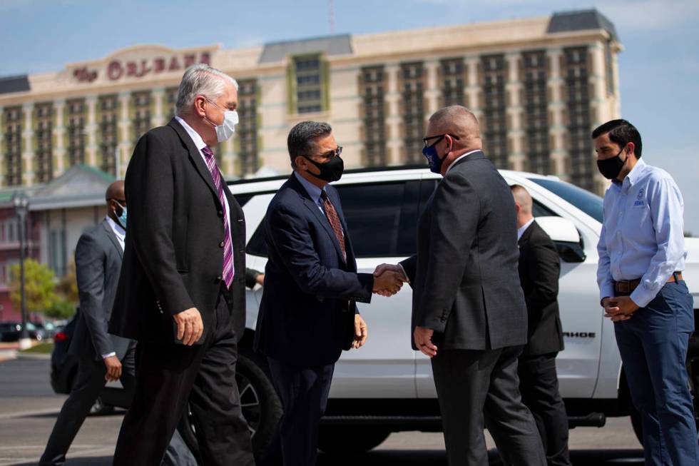 Nevada Governor Steve Sisolak, from left, U.S. Health and Human Services Secretary Xavier Becer ...