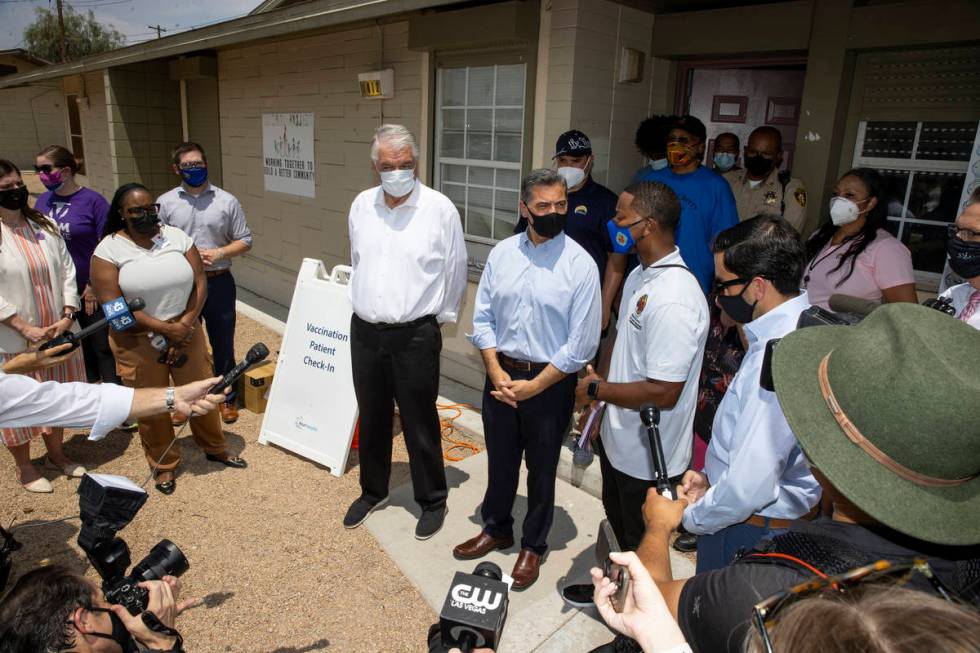 Nevada Governor Steve Sisolak, from left, Health and Human Services Secretary Xavier Becerra, C ...