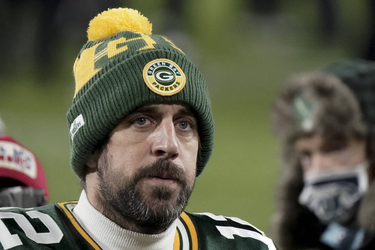FILE - In this Sunday, Jan. 24, 2021, file photo, Green Bay Packers quarterback Aaron Rodgers ( ...