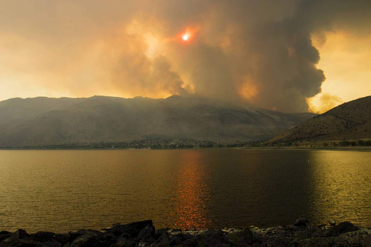 The Tamarack Fire burns around Topaz Lake, Nev., Friday, July 23, 2021. (Ty Oneil/Special to th ...