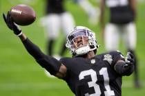 Raiders cornerback Isaiah Johnson (31) catches a pass during warm ups before the start of an NF ...