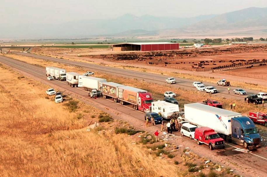 This photo shows the scene of a fatal pileup, Sunday, July 25, 2021, on Interstate 15 in Millar ...