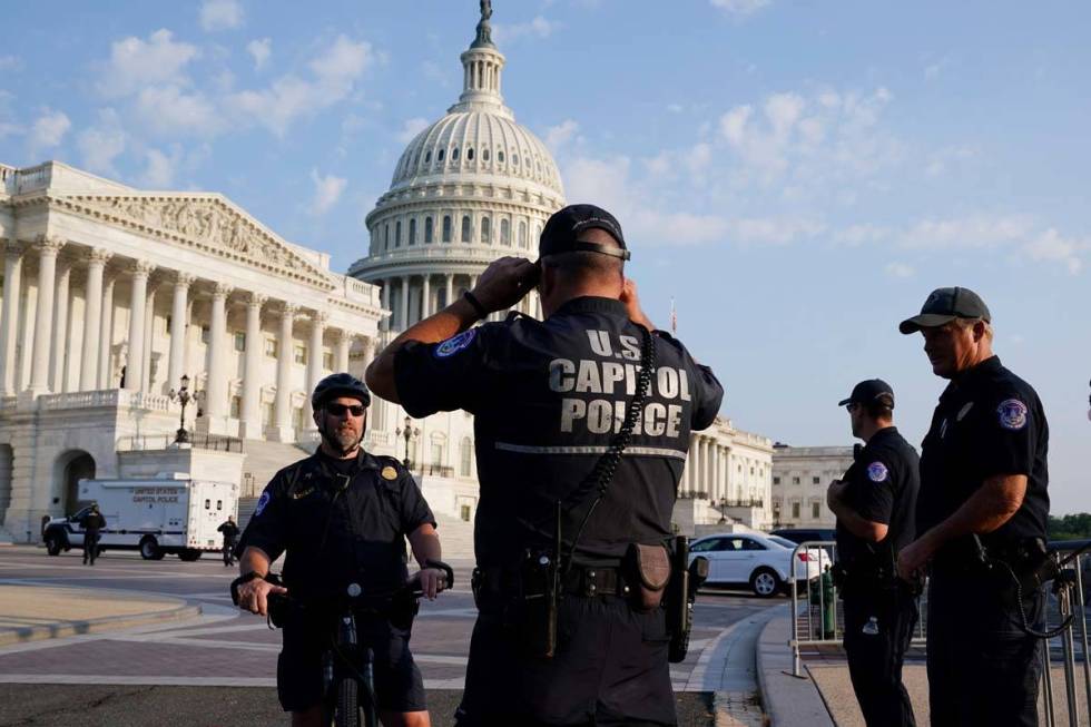 The U.S. Capitol is seen in Washington, early Tuesday, July 27, 2021, as U.S. Capitol Police wa ...