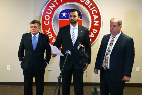 Clark County Republican Party Vice Chairman Stephen Silberkraus, center, speaks during a press ...