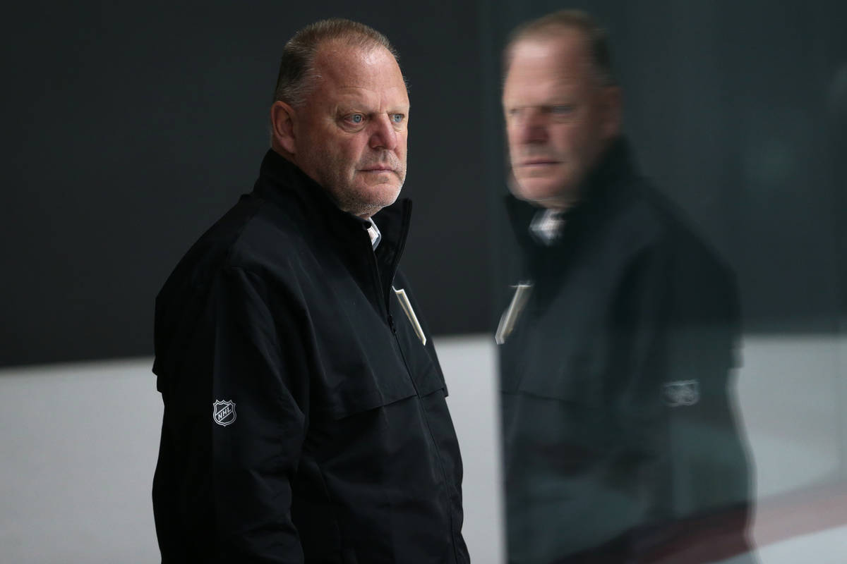 Vegas Golden Knights head coach Gerard Gallant watches players during development camp at City ...