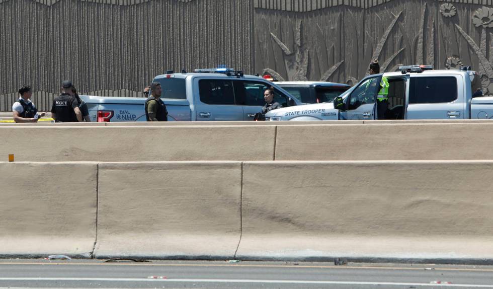 A heavy police presence is visible on Interstate 15 near Sahara Avenue in Las Vegas, Tuesday, J ...