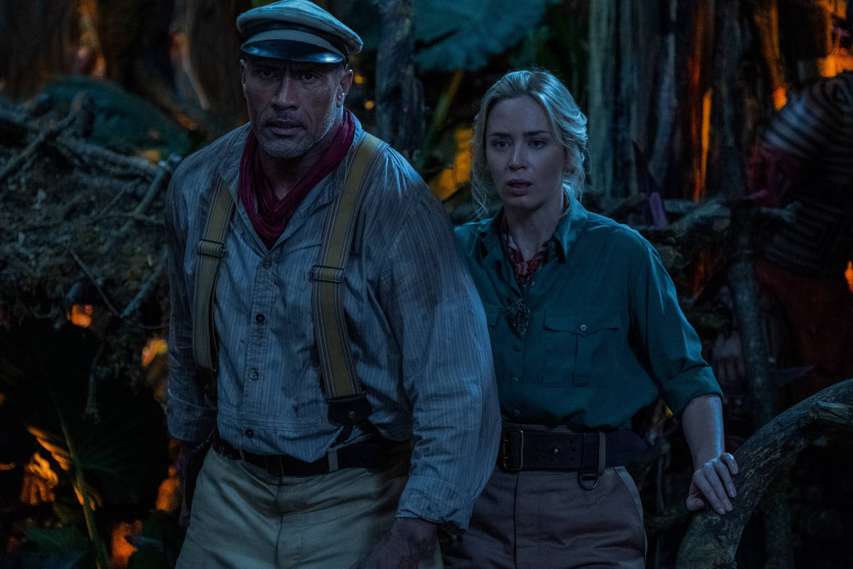 Dwayne Johnson is Frank Wolff and Emily Blunt is Lily Houghton in Disney’s "Jungle Cruise." ( ...