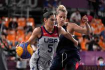 United States' Kelsey Plum (5) drives past Olga Frolkina (15), of the Russian Olympic Committee ...